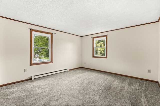 191 Franklin St Unit A, Stoneham, MA 02180 - unfurnished room with a baseboard heating unit, ornamental molding, carpet, baseboards, and a textured ceiling