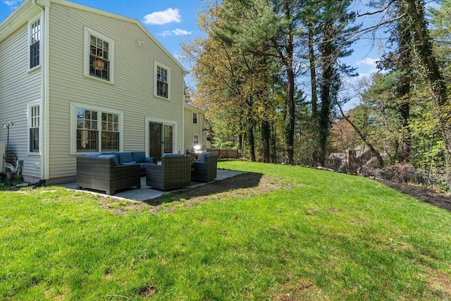 back of house with a patio, a yard, and outdoor lounge area