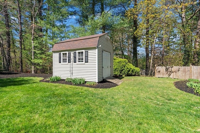 view of shed with fence