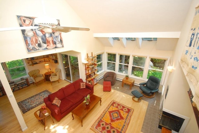 4 Half Moon Hl Unit 4, Acton, MA 01720 - living room with a high ceiling, wood finished floors, a baseboard heating unit, and ceiling fan