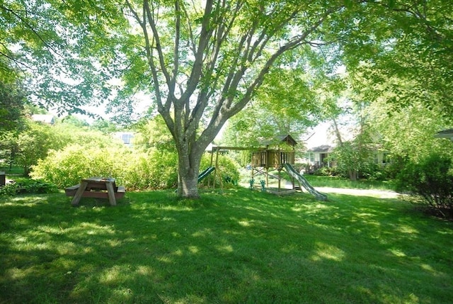4 Half Moon Hl Unit 4, Acton, MA 01720 - view of grassy yard featuring a playground