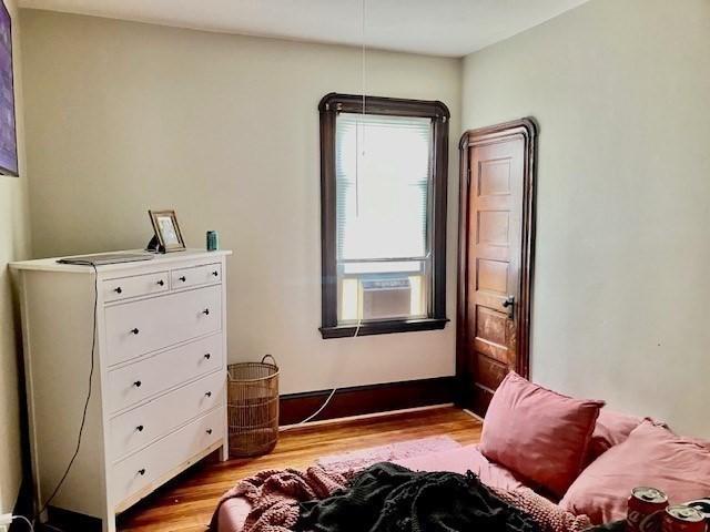 bedroom with light wood-type flooring