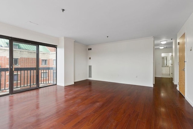 empty room featuring dark hardwood / wood-style floors