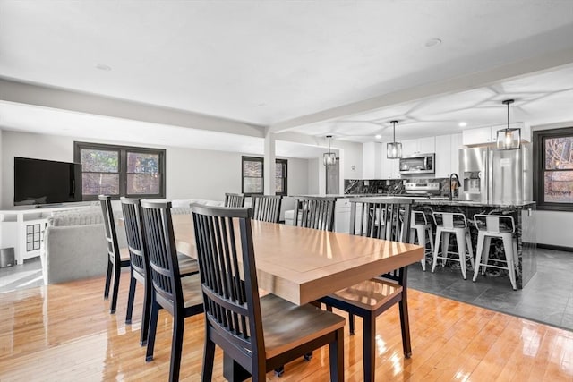dining room featuring light wood-type flooring