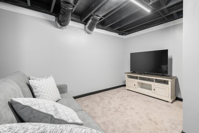 carpeted living room with baseboards