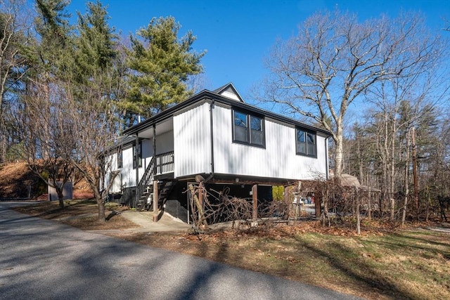 view of front of property featuring stairs