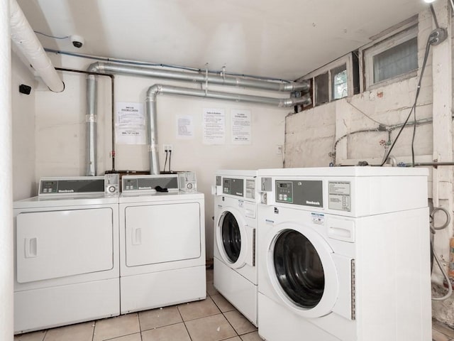 8 Walnut St Unit 8, Everett, MA 02149 - shared laundry featuring independent washer and dryer and light tile patterned floors