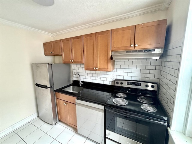 8 Walnut St Unit 8, Everett, MA 02149 - kitchen featuring appliances with stainless steel finishes, under cabinet range hood, crown molding, brown cabinets, and backsplash