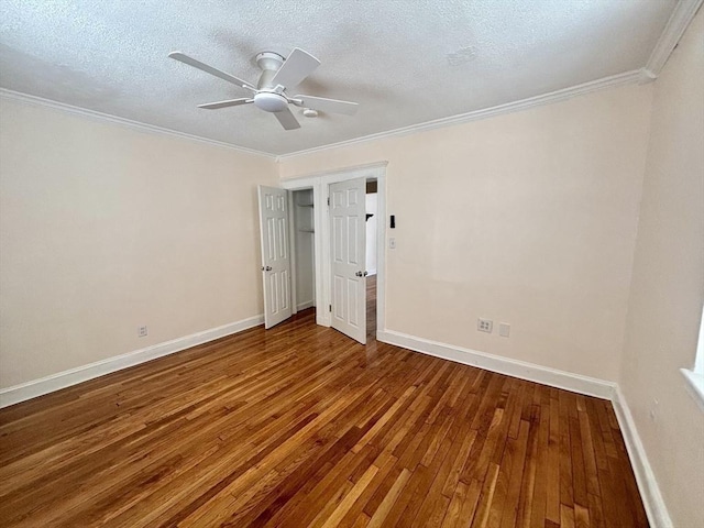 8 Walnut St Unit 8, Everett, MA 02149 - unfurnished bedroom with hardwood / wood-style flooring, ornamental molding, ceiling fan, and a textured ceiling
