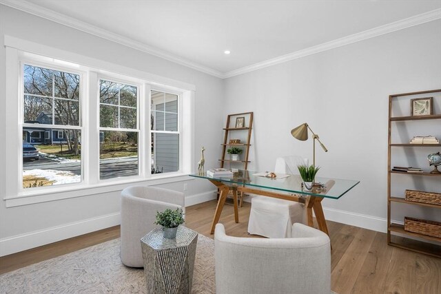 office with light wood-style floors, baseboards, ornamental molding, and recessed lighting