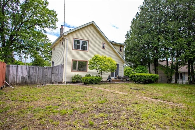 22 Everton Ave, Worcester, MA 01604 - rear view of house featuring a chimney