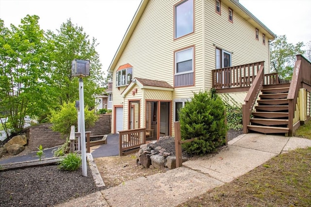 22 Everton Ave, Worcester, MA 01604 - view of side of home featuring stairs and a wooden deck