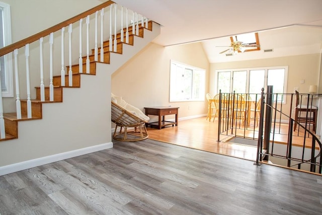 22 Everton Ave, Worcester, MA 01604 - stairs featuring wood finished floors, baseboards, a ceiling fan, and vaulted ceiling