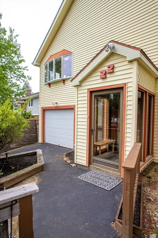 22 Everton Ave, Worcester, MA 01604 - property entrance featuring an attached garage