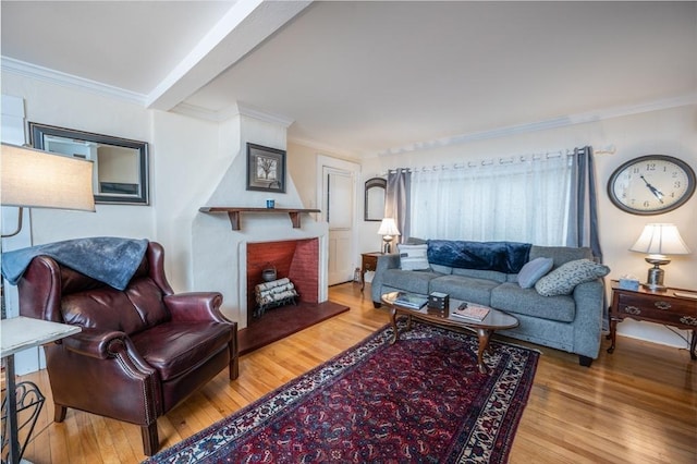 203 Pond St, Weymouth, MA 02190 - living area with wood finished floors, crown molding, and a large fireplace