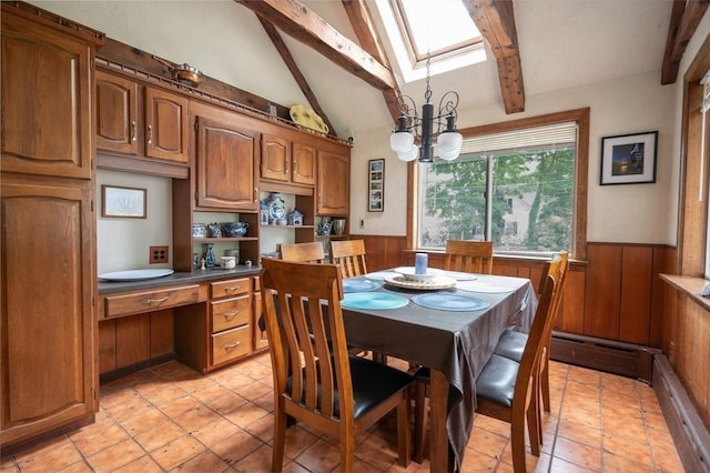 203 Pond St, Weymouth, MA 02190 - dining space featuring wainscoting, beam ceiling, wooden walls, a baseboard radiator, and a chandelier
