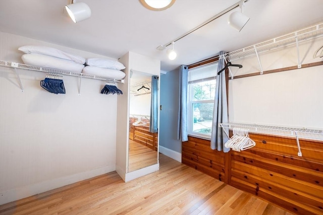203 Pond St, Weymouth, MA 02190 - spacious closet featuring wood finished floors