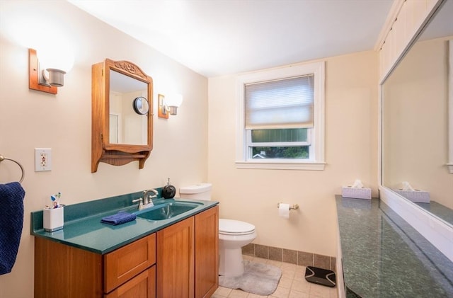 203 Pond St, Weymouth, MA 02190 - bathroom with toilet, tile patterned floors, vanity, and baseboards