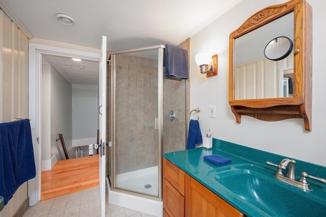 203 Pond St, Weymouth, MA 02190 - bathroom featuring a shower stall, vanity, and tile patterned flooring