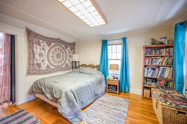 203 Pond St, Weymouth, MA 02190 - bedroom with wood finished floors and ornamental molding
