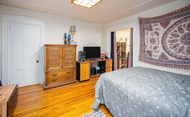 203 Pond St, Weymouth, MA 02190 - bedroom with light wood-type flooring, an office area, and crown molding