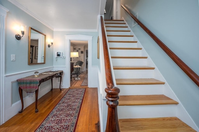 203 Pond St, Weymouth, MA 02190 - stairway featuring wood finished floors and ornamental molding