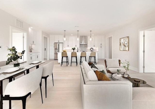living area featuring light wood finished floors