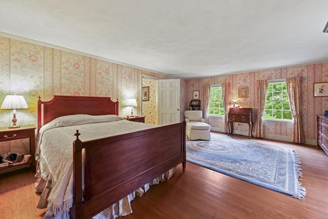 84 Englewood Rd, Longmeadow, MA 01106 - bedroom featuring wallpapered walls, wood finished floors, and baseboards