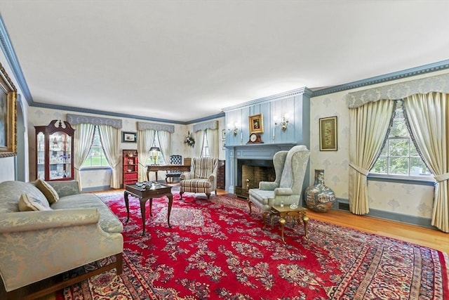 84 Englewood Rd, Longmeadow, MA 01106 - living room featuring ornamental molding, wallpapered walls, wood finished floors, a fireplace, and baseboards