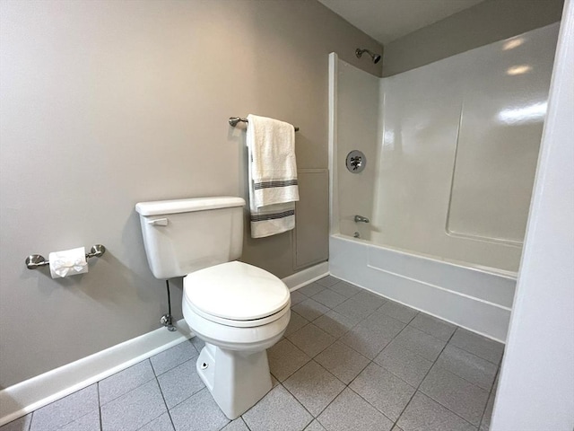 1550 Worcester Rd Unit 524, Framingham, MA 01702 - full bath with tile patterned floors, toilet, baseboards, and shower / bath combination
