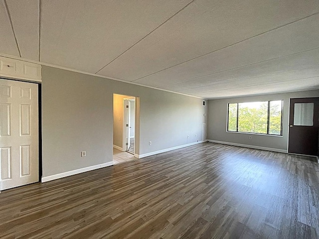 1550 Worcester Rd Unit 524, Framingham, MA 01702 - empty room with dark wood-style flooring and baseboards