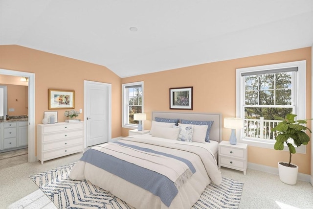 21 Bearberry Path Unit 0, Plymouth, MA 02360 - bedroom with vaulted ceiling, baseboards, light carpet, and connected bathroom