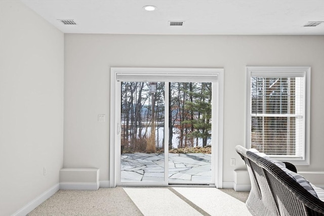 21 Bearberry Path Unit 0, Plymouth, MA 02360 - doorway to outside featuring light carpet, baseboards, and recessed lighting