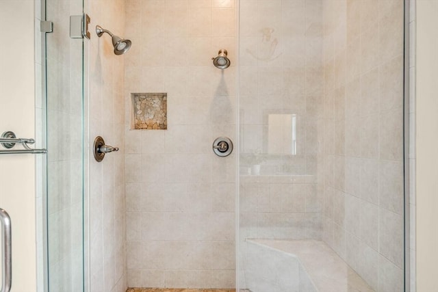 bathroom with an enclosed shower