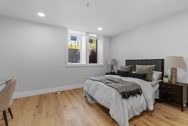 bedroom featuring light hardwood / wood-style floors