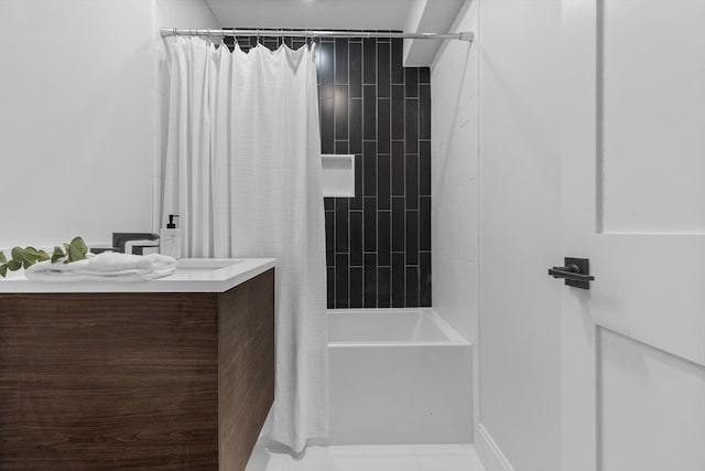 bathroom with shower / bath combo with shower curtain and tile patterned flooring