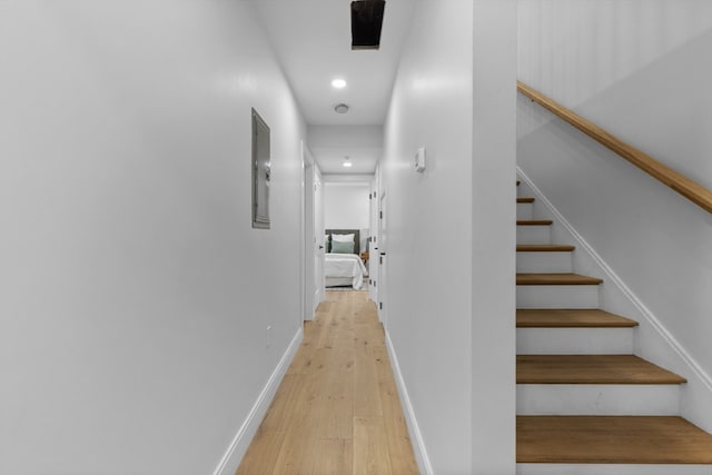 corridor featuring light hardwood / wood-style flooring