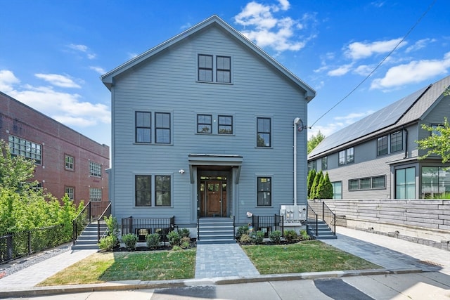 view of front of home with a front yard