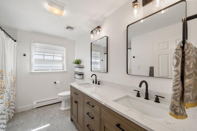 1 Liberty Ln, North Reading, MA 01864 - full bathroom with baseboard heating and double vanity