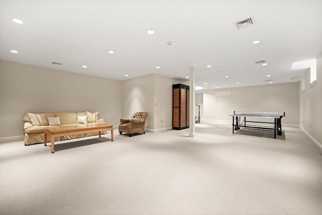 living room featuring light carpet, visible vents, and recessed lighting