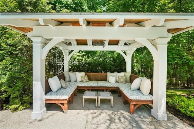 view of patio featuring an outdoor hangout area and a gazebo