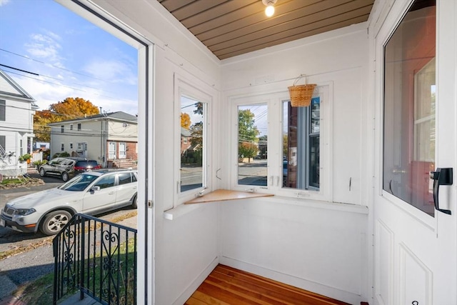 sunroom with wooden ceiling