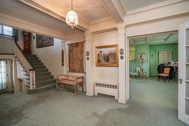 interior space with stairs, crown molding, radiator heating unit, and beam ceiling