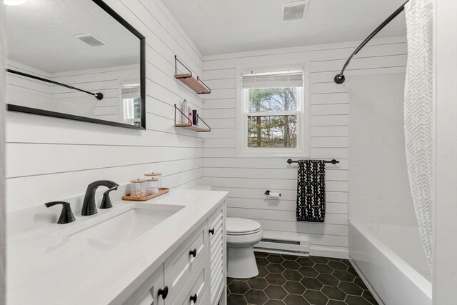 47 Plantation Rd Unit 47, Oxford, MA 01540 - full bathroom with baseboard heating, visible vents, toilet, and tile patterned flooring