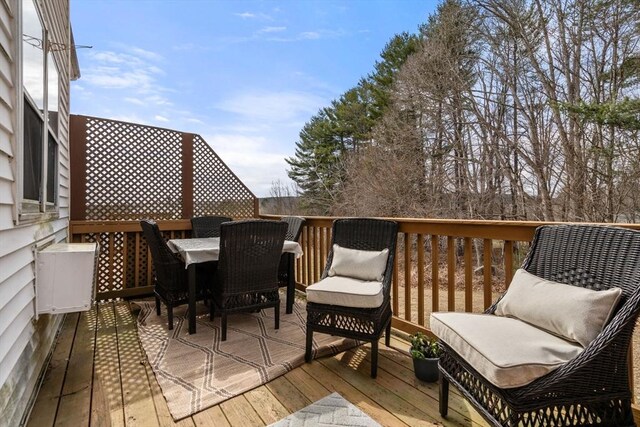 47 Plantation Rd Unit 47, Oxford, MA 01540 - wooden deck with outdoor dining space
