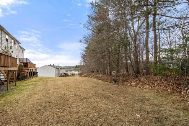 47 Plantation Rd Unit 47, Oxford, MA 01540 - view of yard with stairway and a wooden deck