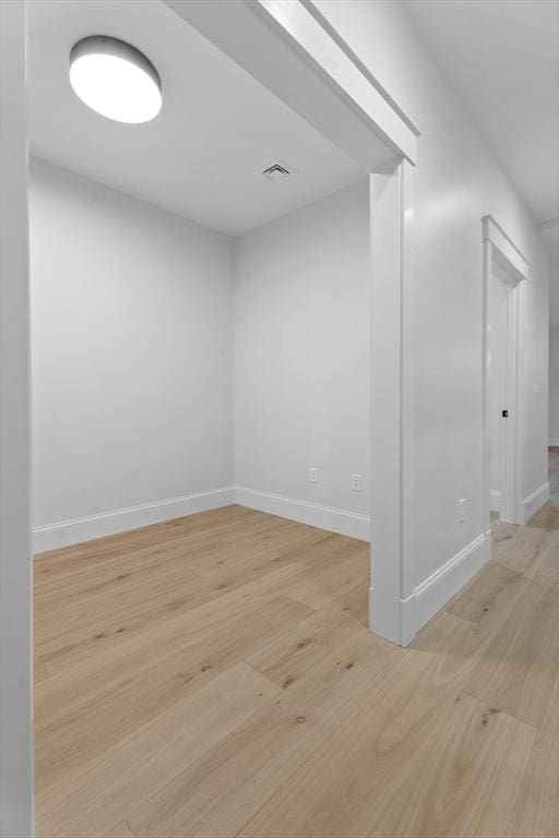 empty room with light wood-type flooring