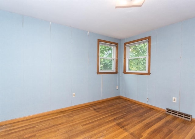 177 Pine Hill Cir, Waltham, MA 02451 - empty room with wood finished floors and baseboards