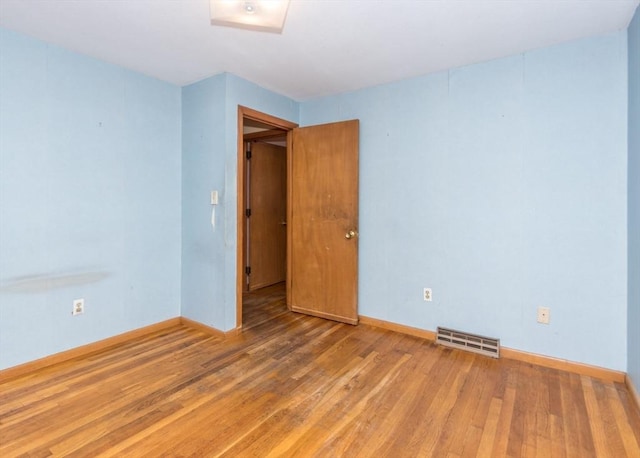 177 Pine Hill Cir, Waltham, MA 02451 - unfurnished bedroom featuring wood finished floors and baseboards