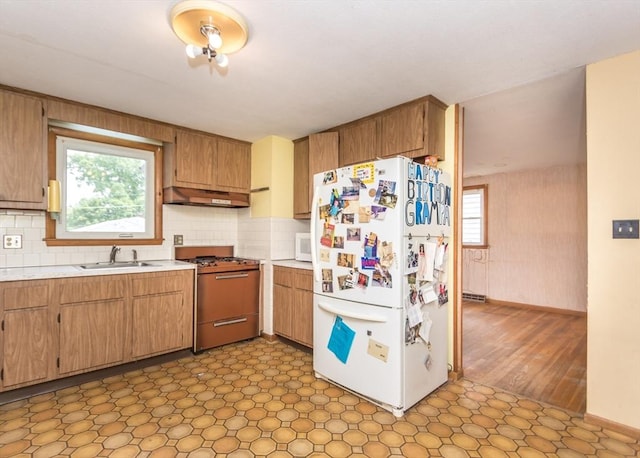 177 Pine Hill Cir, Waltham, MA 02451 - kitchen with white appliances, extractor fan, a sink, and light countertops